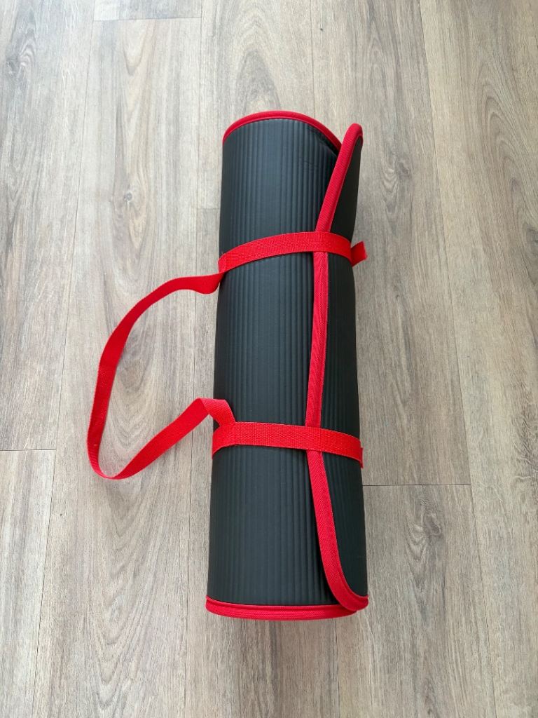 Black Yoga Mat with Red Trim – Good Condition