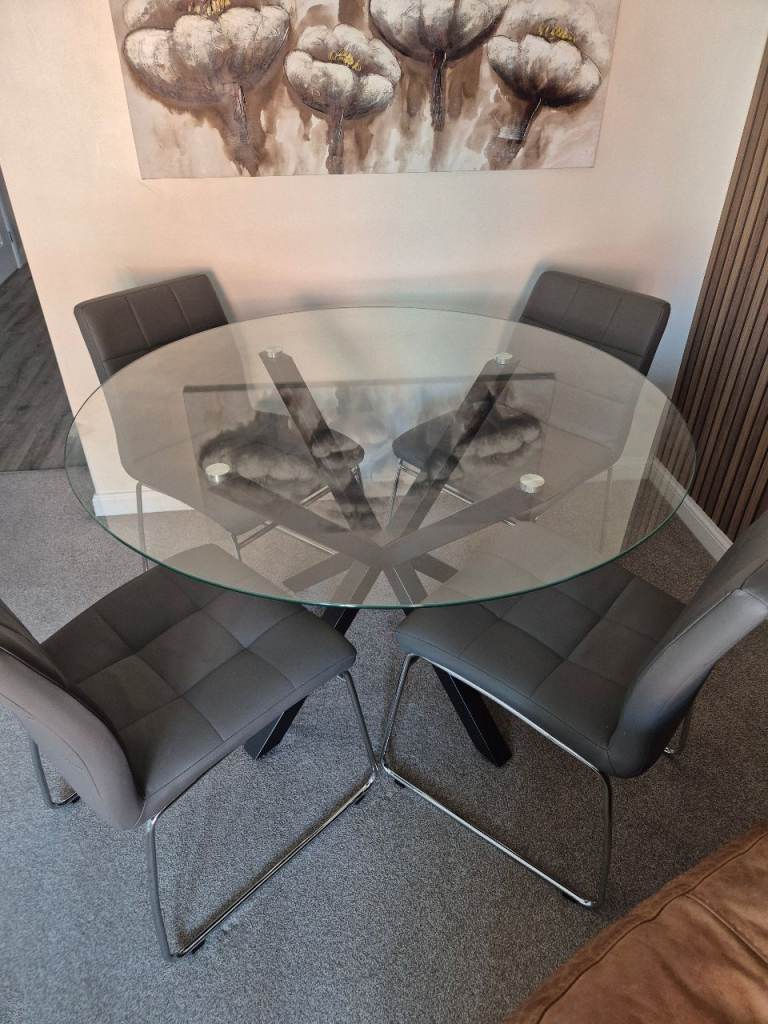 Glass table with 4 chairs
