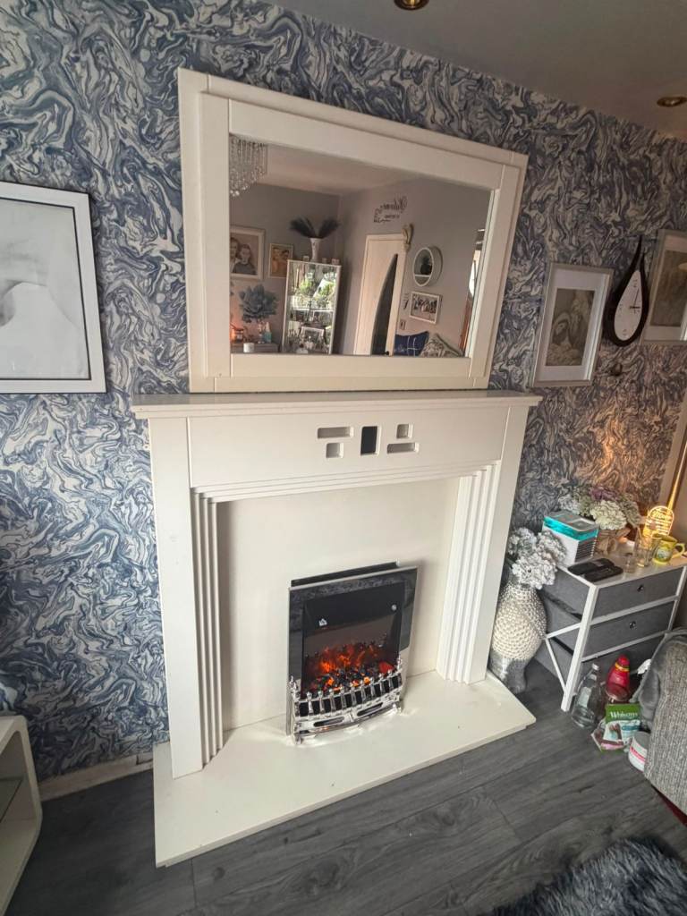 Really nice modern fireplace with mirror and electric fire inset £199