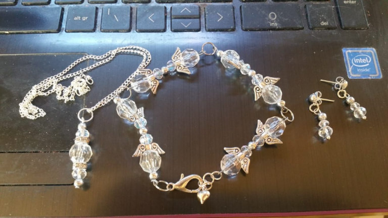 Angel bracelet, Beaded earrings & Necklace Brand new