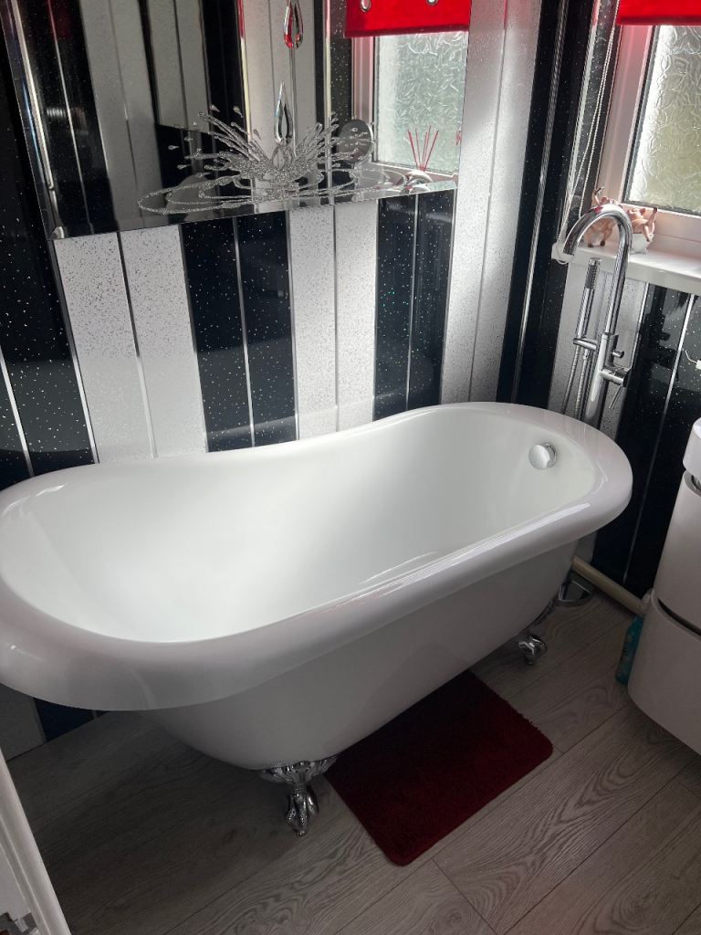 Free standing bath with shower/tap
