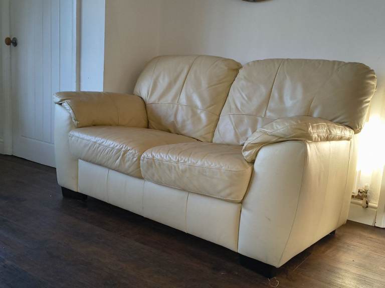 Ivory leather sofa 2 seater.