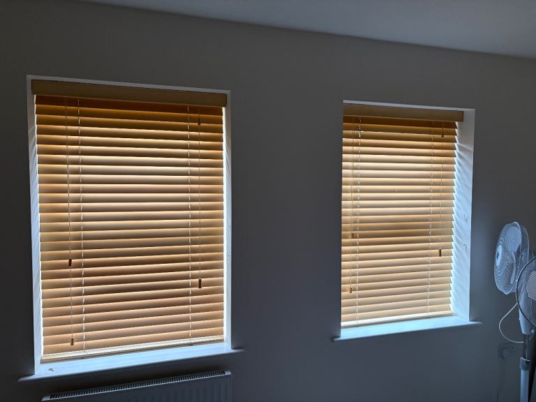 Wooden blinds and roller blinds