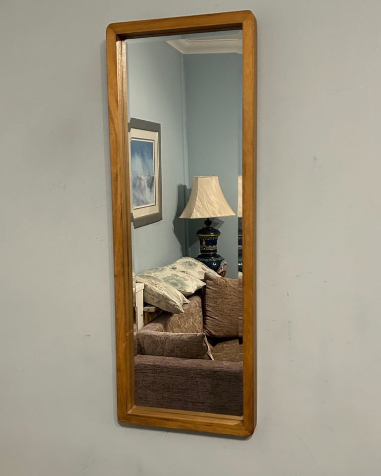Light Wooden Framed Bevelled Mirror  H37in/94cm W13in/30cm Good condition  NO OFFERS  D344