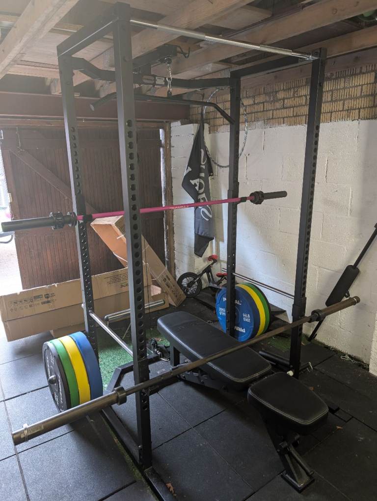 Primal Strength Home Power Rack and lat pull down.