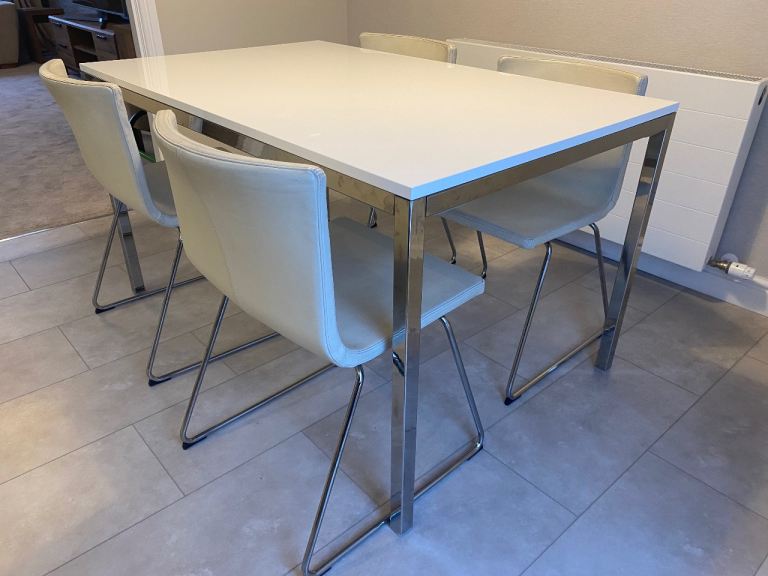 Ikea dining table and 4 leather chairs 