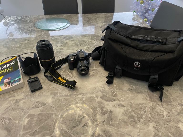 Nikon D5300 DSLR camera with 2 lenses and accessories
