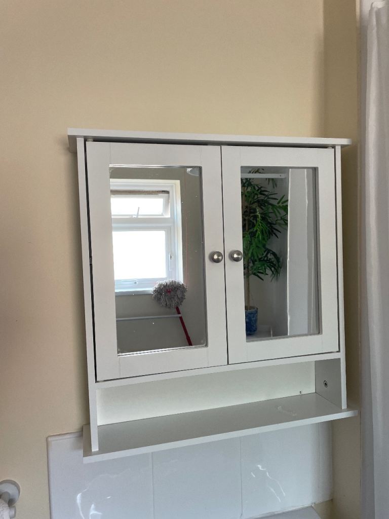 White Wooden Storage Unit with Shelves and Cupboard