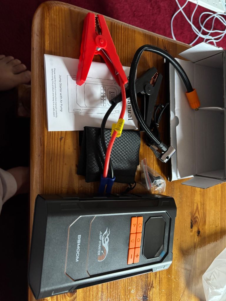 Car jump starter and air pump 