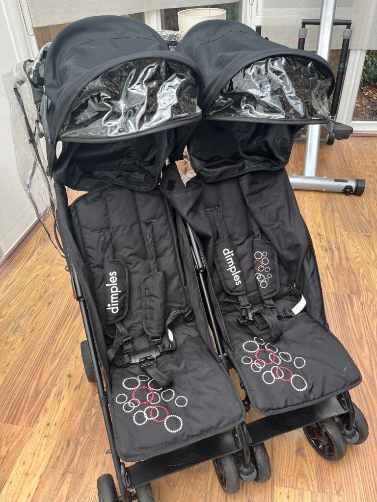 Dimples Black Double Pushchair with Rain Cover – Good Condition