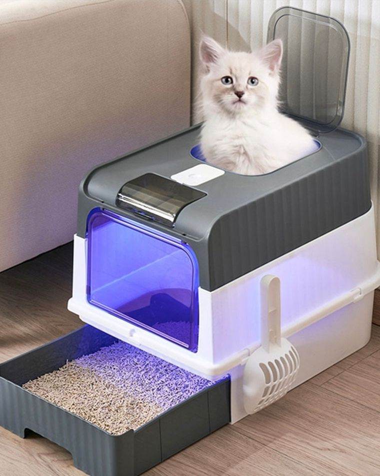 A new still boxed flat packed white x grey pladticcat litter box .