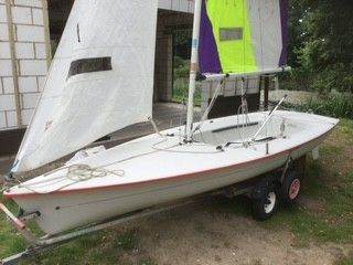 Laser Fun c/w Trapeze, Harness, two sets of sails, road trailer & launching trolley combi