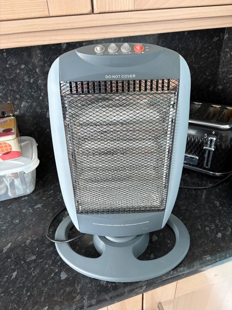 Grey Electric Heater – Good Condition, Oscillating