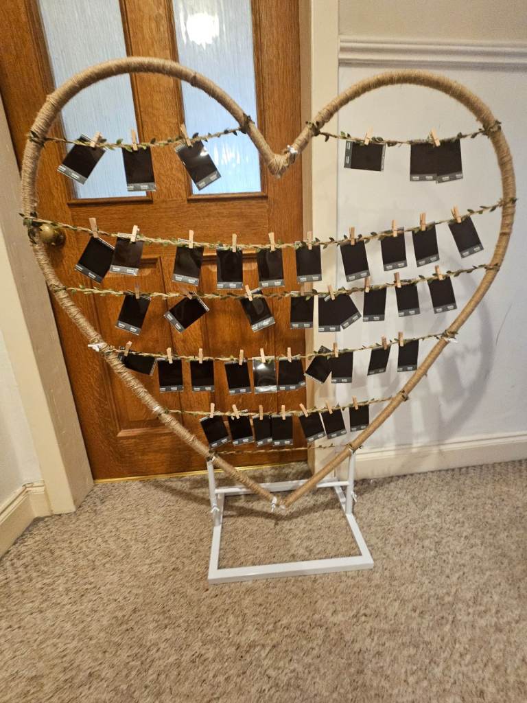 Polaroid hanging heart shaped frame