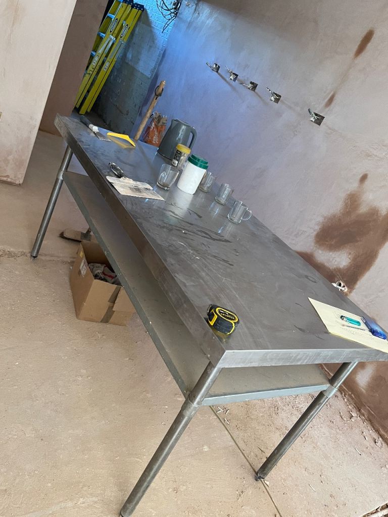 Stainless Steel Dining Table with Shelf – Good Condition