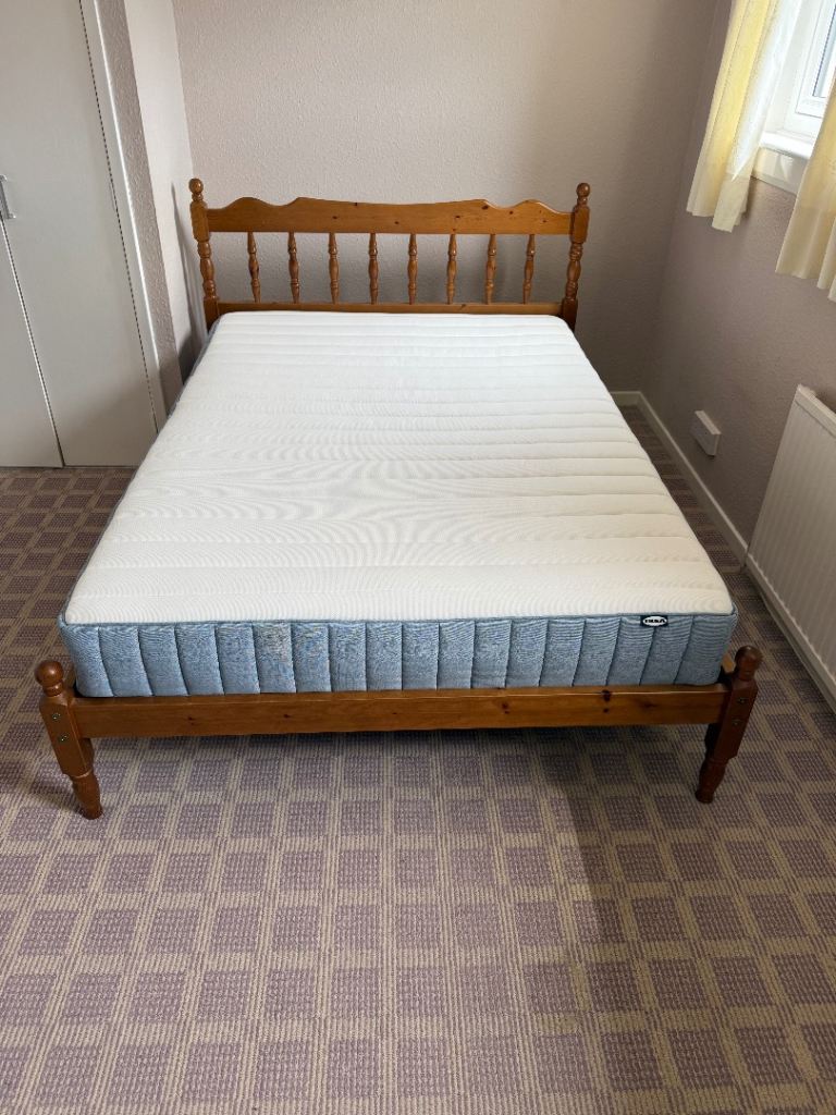 Double bed with almost new mattress