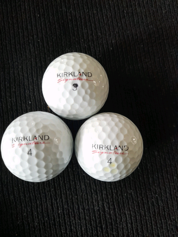 24 Used Kirkland Signature Golf Balls. 