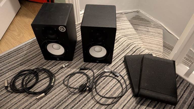 Yamaha HS7 pair + cables/isolation pads.