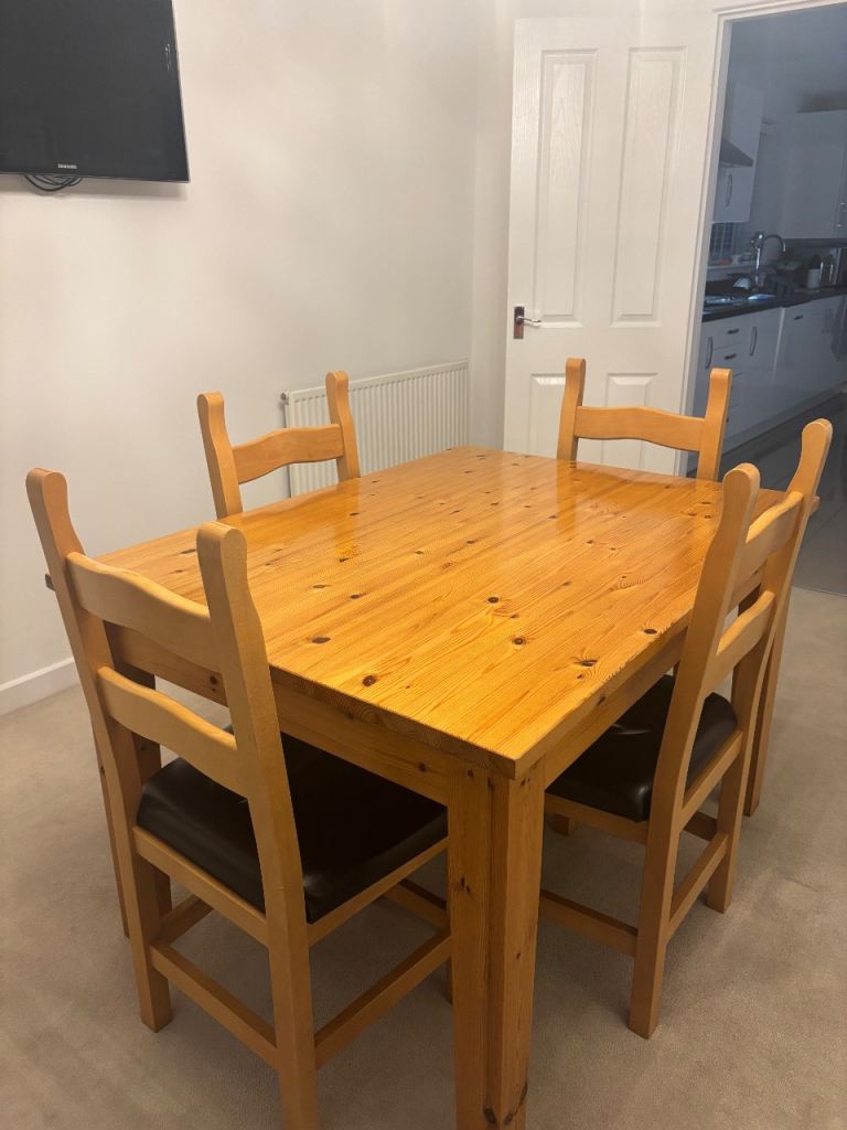 Solid pine table and 4 chairs 