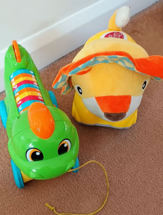 battery operated singing dinosaur (teaching the abc)