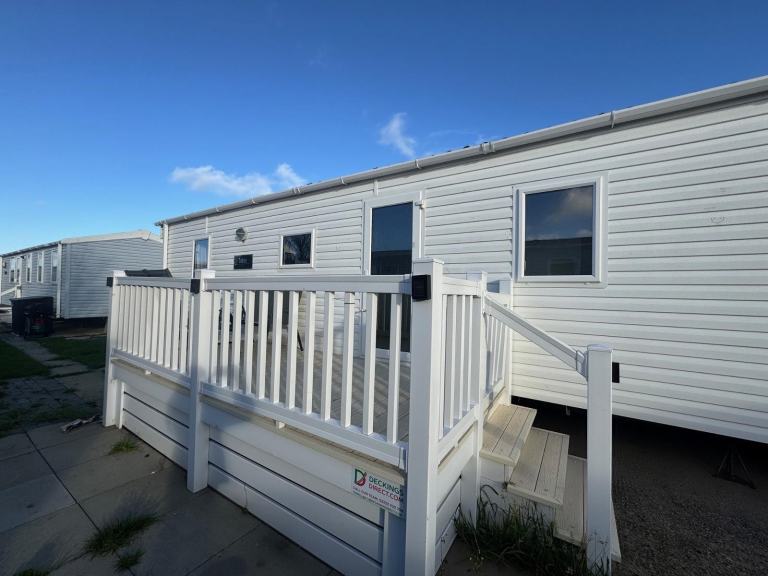 Sited static caravan for sale with decking - Lyons Robin Hood North Wales Rhyl