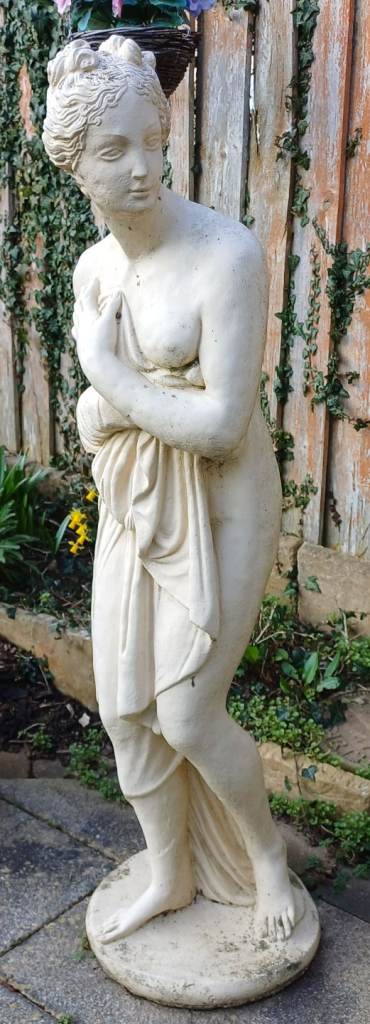 Collection of garden figurines/ornaments.