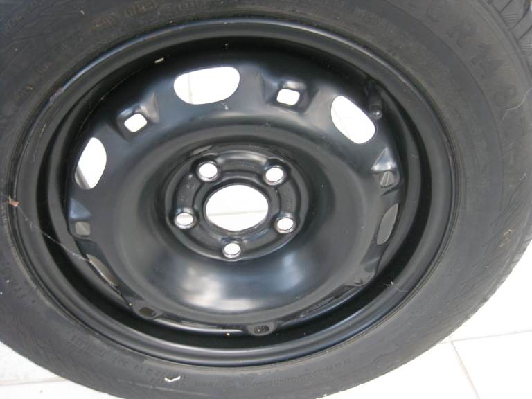 UNUSED SPARE WHEEL, TYRE, FITTING KIT & HOLD DOWN BOLT