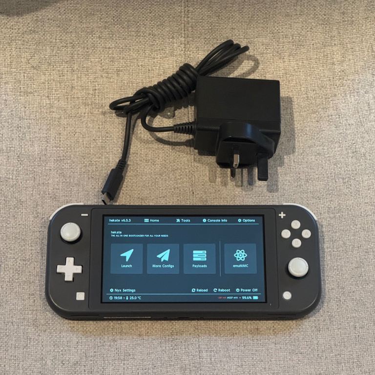 Unpatched Nintendo Switch Lite Console - Grey, Good Condition with Charger
