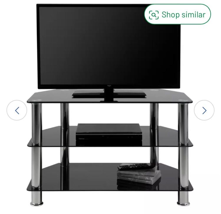 Black glass TV stand in great condition.