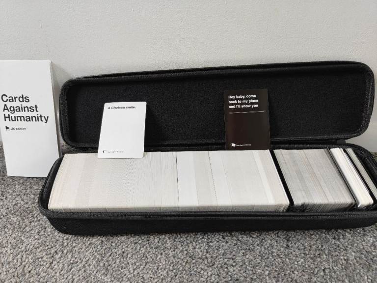 Cards Against Humanity UK Edition with 6 Expansion Packs and Travel Case – As Good As New