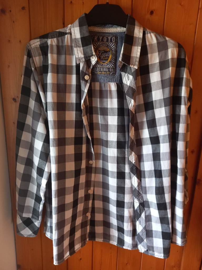 Black and white plaid shirt good condition 