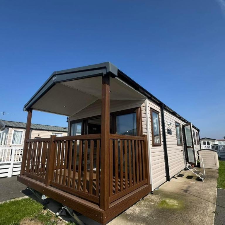 SITED STATIC CARAVAN FOR SALE BY THE COAST