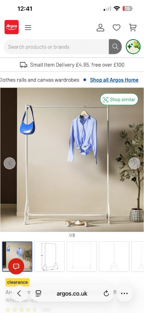 Free white clothes rail.