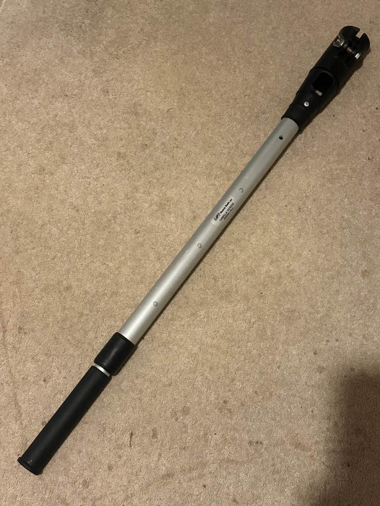 Adjustable length telescopic tiller arm extension