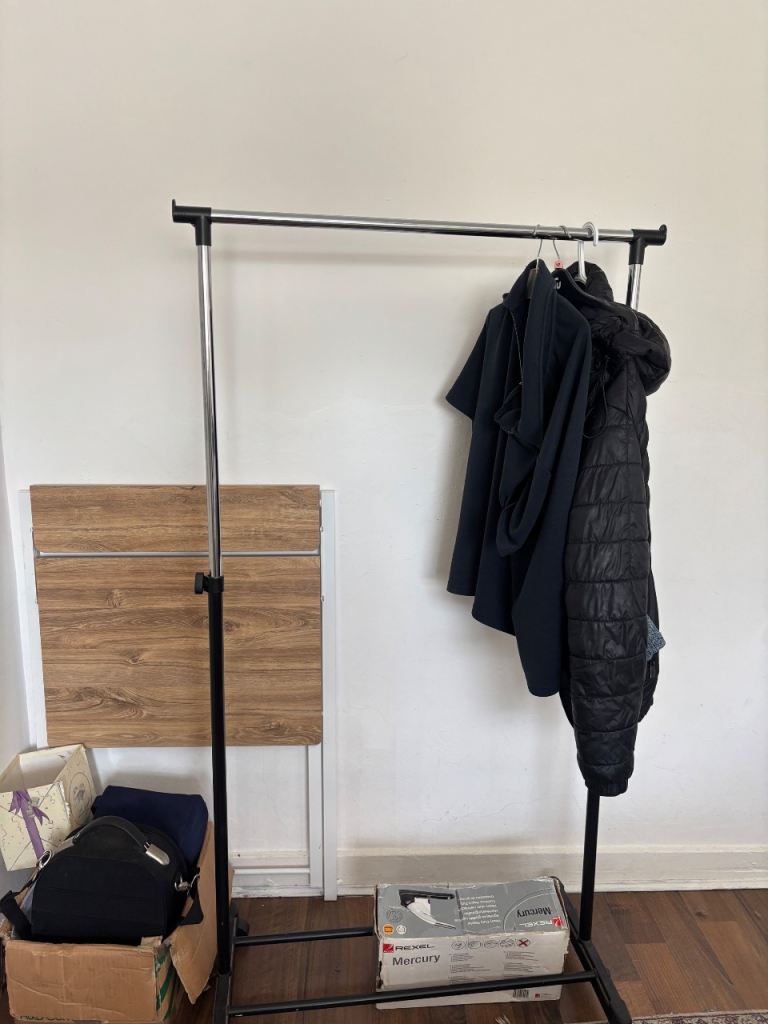 Adjustable Clothes Rail with Wheels – Good Condition