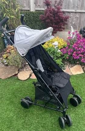 Almost new Britax compact stroller & raincover lightweight, cabin size Great for holidays