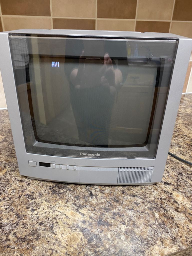 Dumpty TV with coaxial aerial, free glass black TV table if wanted 