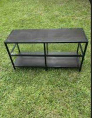 IKEA stand with a glass shelf