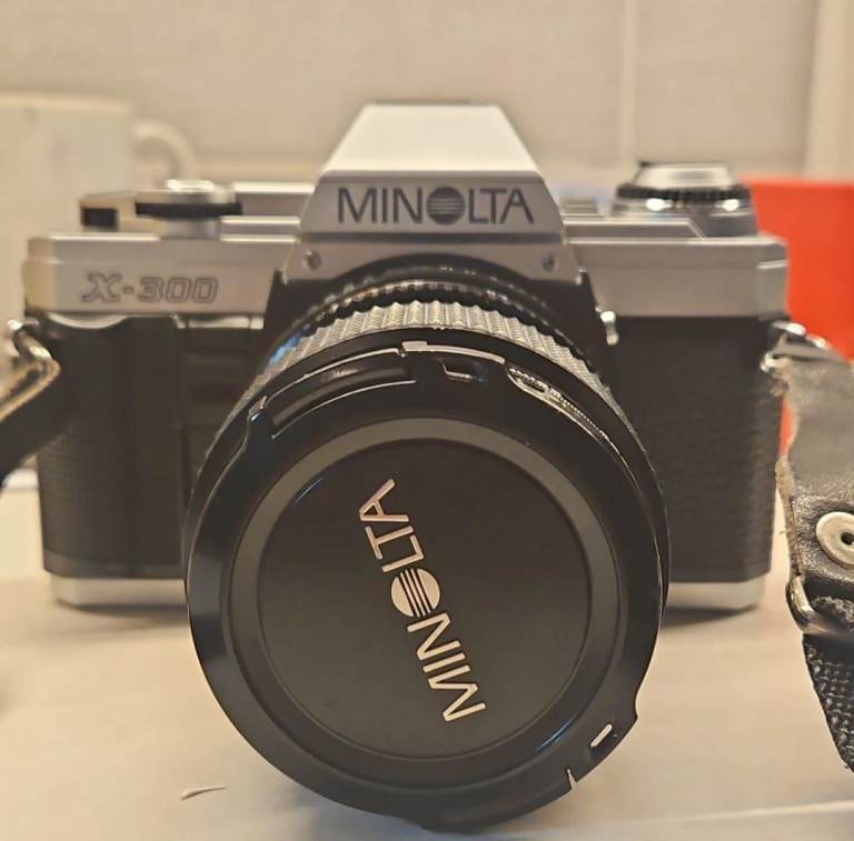 Vintage Minolta x-300 film camera with accessories 