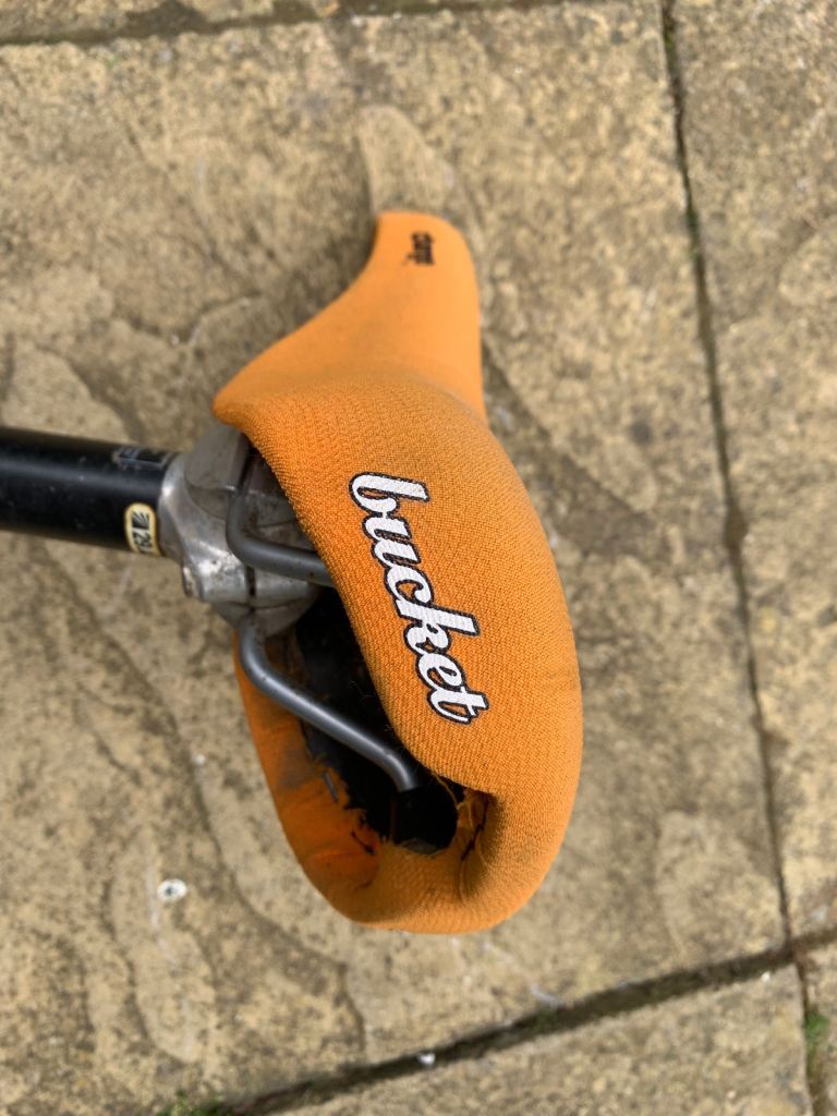 Bike seat in orange.