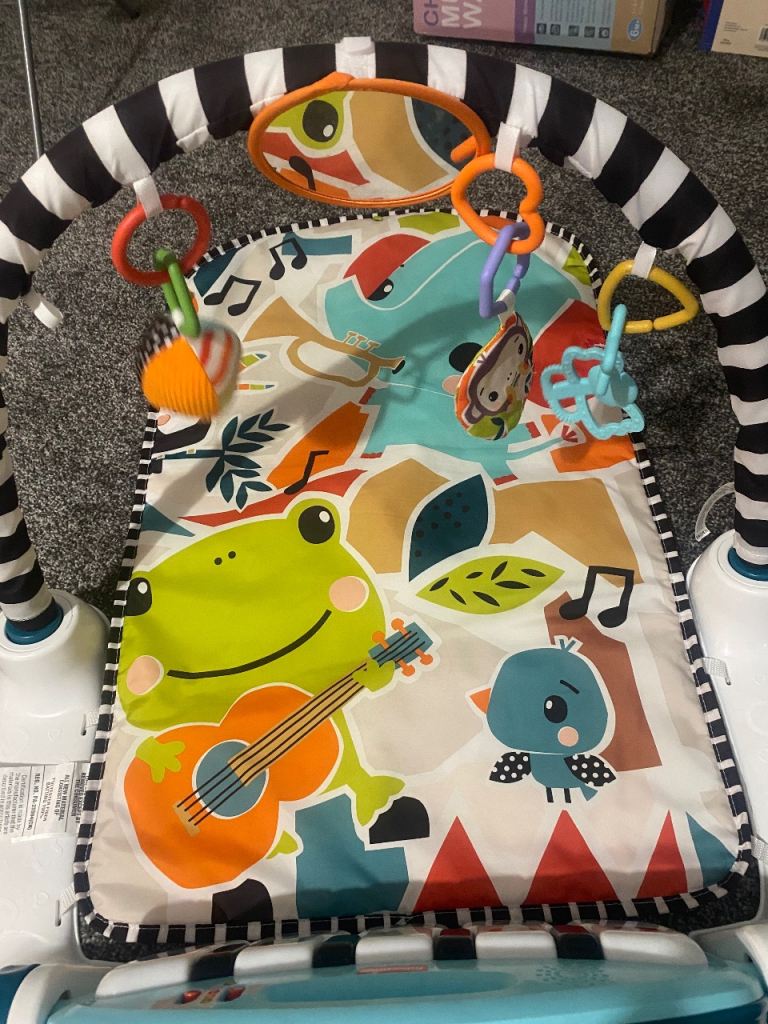 Fisher price glow and grow kick and play piano mat 