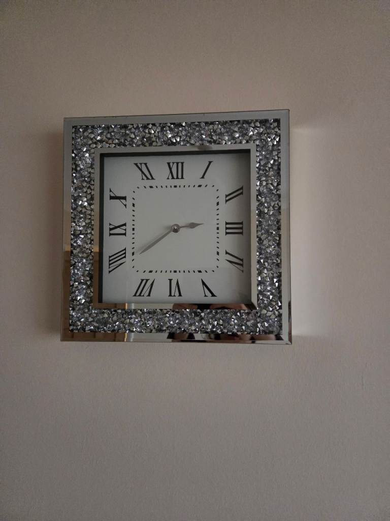 Silver wall clock