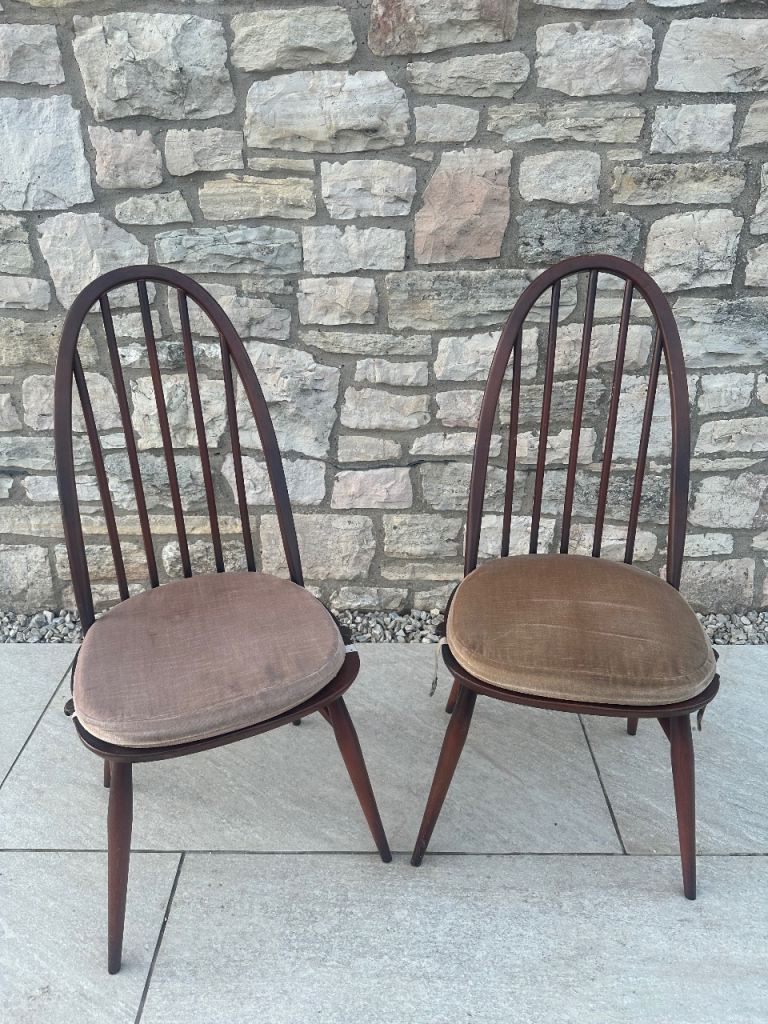 Pair of Ercol Quaker dining kitchen chairs with original seat pads