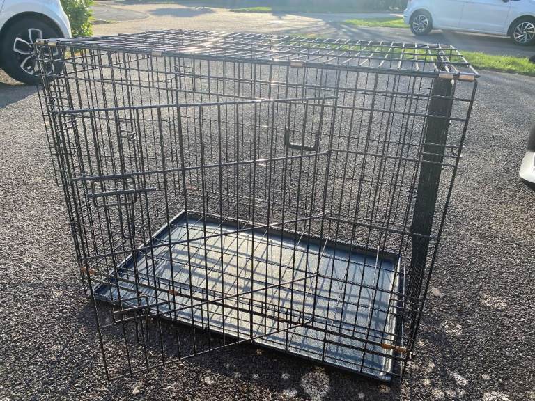 Large dog crate (collapses flat as required)