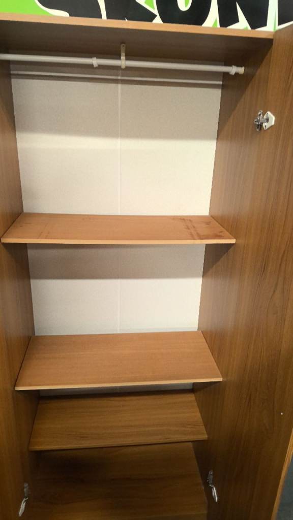 vintage single wardrobe with a rail and adjustable shelves