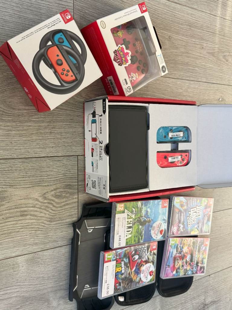 Nintendo Switch OLED & Accessories with Games - Great condition