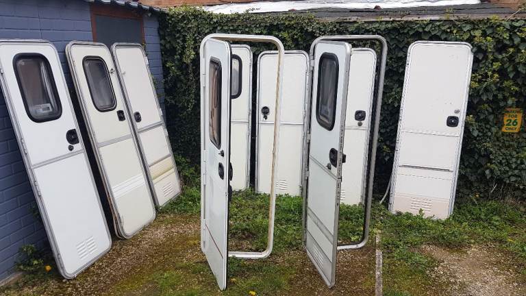 Caravan main doors with frames, with or without windows, blinds locks and keys.