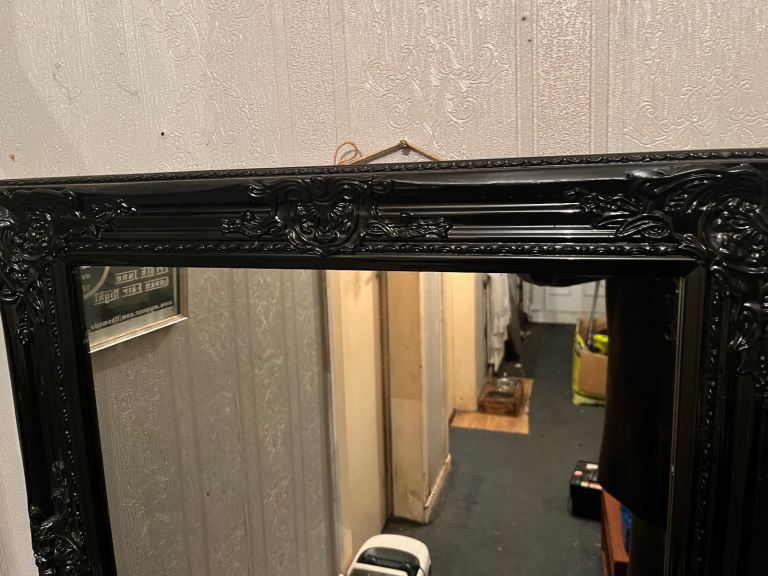 Black rococo style mirror 