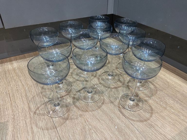 13 champagne glasses £5
