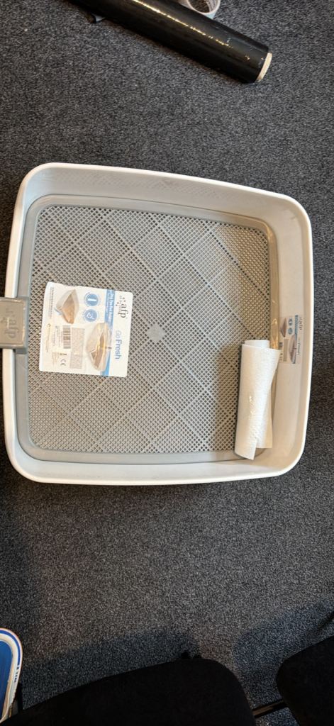 Dog pee pad holder 
